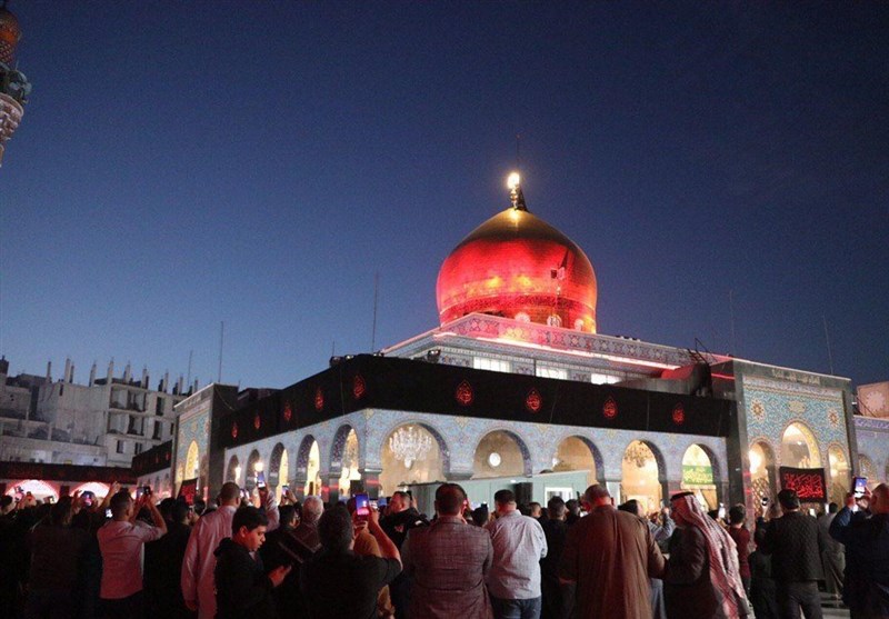 تعویض پرچم گنبد حضرت زینب(س) +عکس