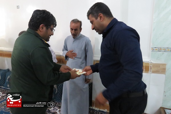دیدار فرمانده ناحیه سپاه کنگان با سه خانواده شهید