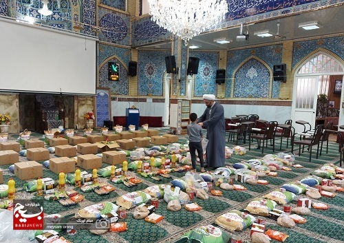 تهیه و توزیع 80 بسته کمک معیشتی و 300 جفت کفش در بین خانواده های آبرومند