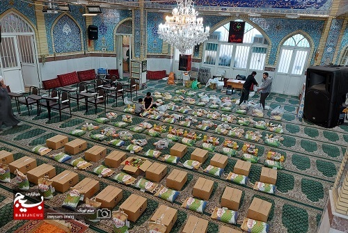 تهیه و توزیع 80 بسته کمک معیشتی و 300 جفت کفش در بین خانواده های آبرومند