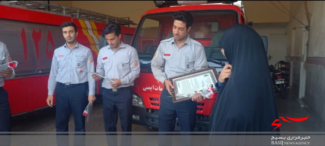 تجلیل بسیجیان قمی از مردان آتش