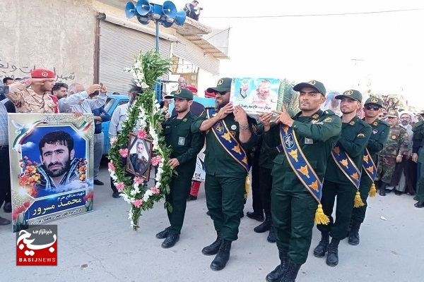 پیکر سردار شهید سید رحیم بازیار در کنار همرزمان شهیدش آرام گرفت + عکس