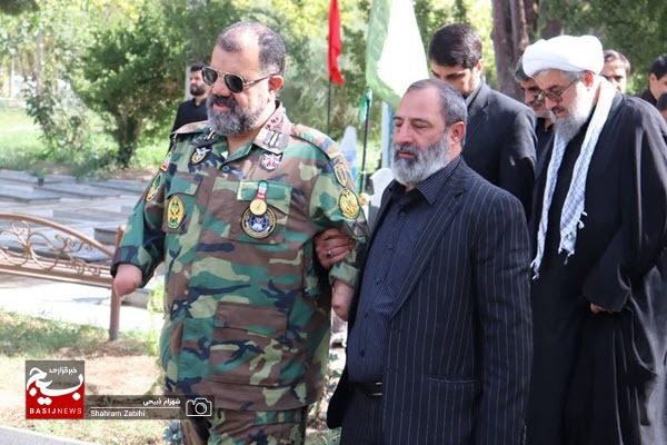 ادای احترام امیر سرتیپ حیدری به شهدای شهرستان ملایر+تصاویر