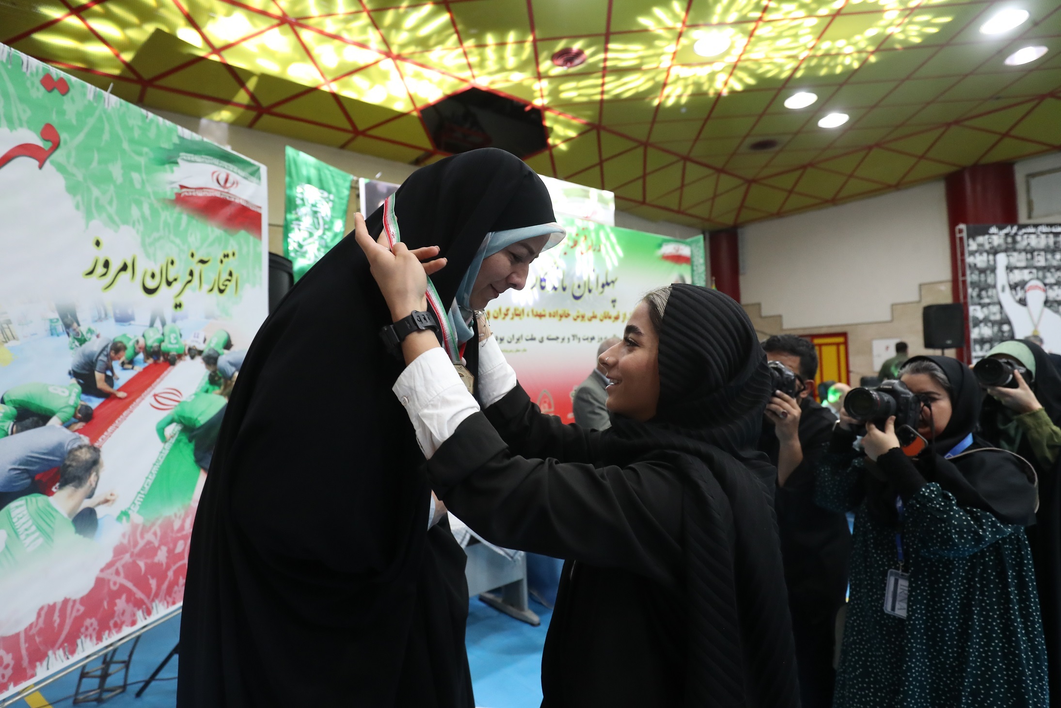 گزارش تصویری از اولین مراسم تجلیل از قهرمانان ملی‌پوش خانواده شهدا، ایثارگران و رزمندگان