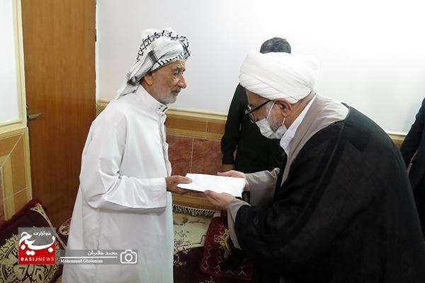 مسئولین کنگان با خانواده شهید علوان ربیعی دیدار کردند
