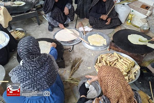 پخت نان و شیرینی محلّی توسط خواهران جهادگر بنکی برای رزمندگان
