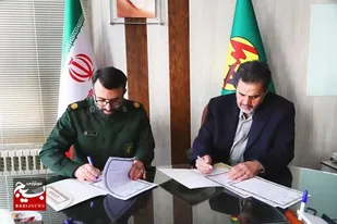 امضای تفاهمنامه همکاری بین سازمان بسیج ادارات و شرکت توزیع نیروی برق استان همدان