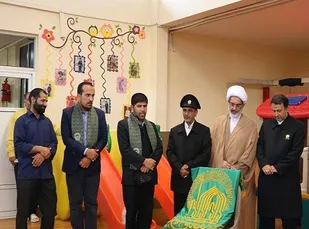 حضور خادمین آستان قدس رضوی به همراه پرچم بارگاه ملکوتی امام رضا(ع) در منطقه ۱۷ تهران