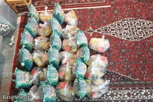 تهیه و توزیع بسته معیشتی توسط بسیجیان پایگاه امام علی(ع) همدان