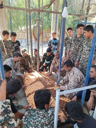 عطر افشانی و غبار روبی مزار مطهر شهدای جنگ تحمیلی ۱۲ روزه در دزپارت