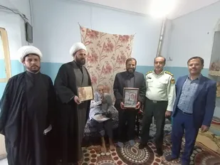 دیدار با خانواده تنها شهید کارمند شهرستان زرند