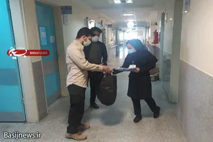 اهدای بیش از ۱۰۰ دست گان پزشکی به بیمارستان شهید قدوسی نهاوند