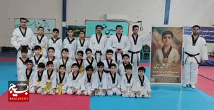 ادای احترام تکواندوکاران شوش به شهید امینی