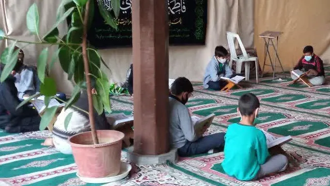 جلسه قرآنی جوانه های صالحین در پایگاه بسیج محمد رسول الله(ص)