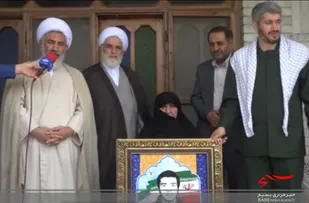 دیدار مسئول دفتر نمایندگی ولی فقیه در سپاه کربلا با خانواده شهدای روحانی بخش بهنمیر