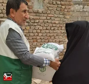 بر سفره های ۲۰۰ خانواده عزتمند در روستاهای شهرستان نیمروز