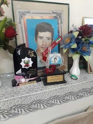 تجلیل کسبه فرخشهر از خانواده معظم شهید بهزاد نوروزی