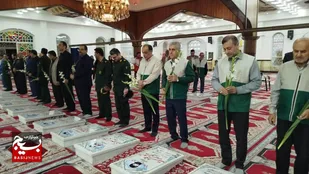 مزار شهدای آستانه اشرفیه گلباران شد
