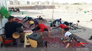 ورزش پهلوانی در بوستان های قم برگزار شد