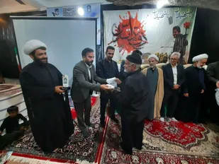 یادواره ۱۴ شهید محله جانبازان در شهر بن برگزار شد