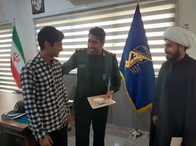 تجلیل از خبرنگار افتخاری  خبر گزاری بسیج بندرعباس