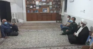دیدار امام جمعه سیراف با خانواده شهید سماچی