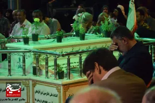 مزار شهید گمنام متبرک به عطر پرچم حرم رضوی