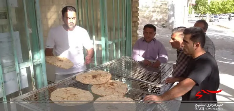 توزیع نان صلواتی در فلارد لردگان