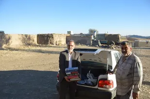 اهدای 200 جلد کتاب خبرنگار بسیج به مدرسه روستای بابارود