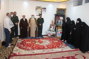 دیدار با خانواده شهیدان روحانی در شهرستان بن