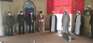 آئین غبار روبی و عطر افشانی مزار شهدای گمنام شهر دیر برگزار شد