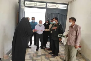 از ۱۵ خانواده شهید قشر کارگری لارستان تجلیل شد