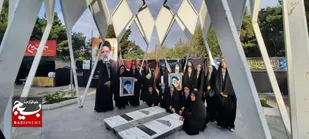 عطر افشانی مزار مطهر شهدای گمنام توسط خواهران بسیجی در چناران