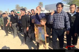 پدر شهیدان پور محمد در کنار فرزندانش آرام گرفت
