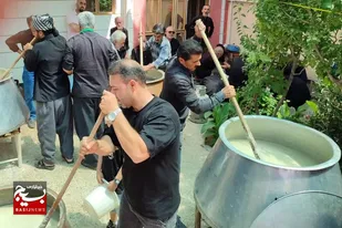پخت حلیم نذری در خیابان سید جمال&zwnj;الدین و مسجد ولی&zwnj;عصر (عج) بهار
