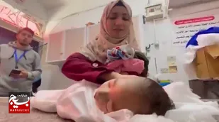 خداحافظی دردناک یک مادر فلسطینی با کودک شیرخوارش