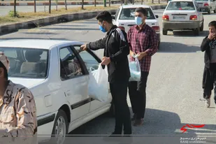 توزیع بسته&zwnj;های بهداشتی توسط بسیجیان حوزه شهید &laquo;بروجردی&raquo; نهاوند