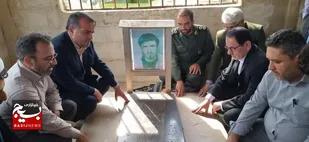 عطرافشانی قبرشهید نادرقلی احمدی