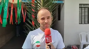 دونده گیلانی در حال ثبت رکورد دویدن ۲۴ ساعته با جلیقه ۵ کیلویی&nbsp;