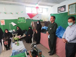 تقدیر و تشکر از مادر شهید در تداوم تهیه دوخت ماسک وگان
