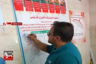 امضا عهدنامه با شهدای اقتدار توسط کارگران کارخانجات استان همدان