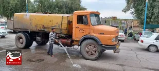 تلاش جهادگران بسیجی  شورای محله اسلامی  برای رفع آبگرفتگی معابر در شوش