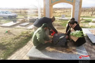 غبارروبی و عطر افشانی گلزار مطهر شهدای روستای شورین