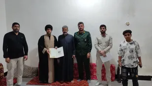 تجلیل از خانواده شهید یابر چنانی در کرخه