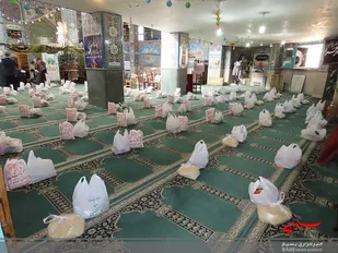 توزیع200بسته معیشتی توسط ناحیه مقاومت بسیج و اداره اوقاف شهرضا