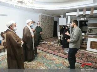 دیدار مسئول دفتر نمایندگی ولی فقیه در سپاه کربلا با خانواده شهید رجایی فر