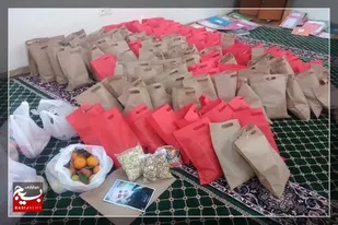 توزیع بیش از ۱۲٠٠ بسته معیشتی شب یلدا در بین نیازمندان لامرد
